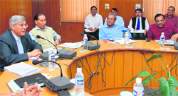 RH Khwaja (left), Union Tourism Secretary, during a meeting in Dehradun