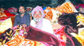 Anxious relatives of the victims at the factory collapse site in Jalandhar.