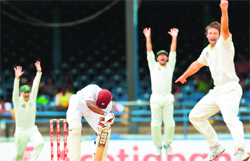 Australias Ben Hilfenhaus (right) and teammates appeal during the final day of the second Test against the West Indies at Queens Park Oval in Port-of-Spain. 