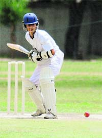 A player in action during a cricket match at DAV school, Sector 8, Chandigarh, on Saturday