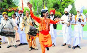 Dhadis and dholis perform during Baisakhi celebrations at the Punjab Kala Bhavan, Sector 16, Chandigarh, on Saturday