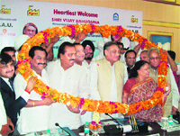 Chief Minister Vijay Bahuguna being felicitated at a function organised by the Kumaon Garhwal Chamber of Commerce and Industry at Rudrapur on Saturday.