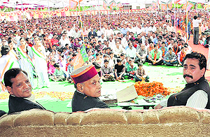 Chief Minister Prem Kumar Dhumal at a public meeting at Sulah near Palampur on Saturday