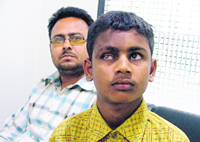 Visually impaired Kamlesh with his teacher Jaswinder Kumar.
