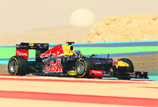 Red Bull Racings Sebastian Vettel drives during the qualifying session at the Bahrain international circuit in Manama on Saturday
