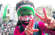 A girl during an anti-regime demonstration in the town of Talbisseh in Homs province. 