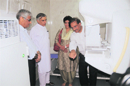 Union minister Pawan Kumar Bansal and PGI Director YK Chawla interact with the staff of the Asha Jyoti womens healthcare mobile outreach programme at the health institute in Chandigarh on Sunday.