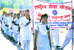 Students take out an awareness march on World Earth Day in Haridwar on Sunday