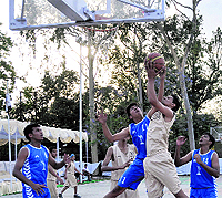 A match in basketball tournament under way in Dehradun on Sunday