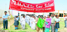 Dr Vedika Nehra flags off a rally on the occasion of the World Earth Day at Bhattu Kalan in Fatehabad on Sunday.
