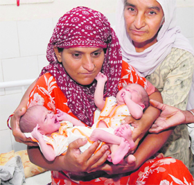 Amarjit Kaur with her twins at Civil Hospital in Bathinda.