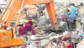 An NDRF team engaged in the rescue operation at the Shital Fibres factory collapse site in Jalandhar on Sunday