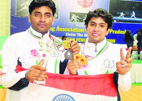 Rashid Ahmad and Ujjwal Gupta with their medals at Hyderabad