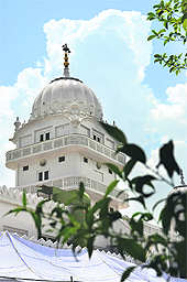 Manji Sahib Gurdwara in Alamgir village presents a majestic view, with thick clouds in the background on Sunday