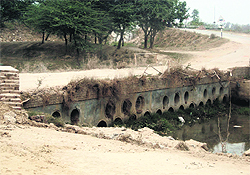 Near collapsing bridge at drain near Kothe Khajura village on the outskirts of Jagraon