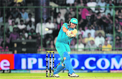 Pune Warriors Jesse Ryder plays a shot during their match against Delhi Daredevils in New Delhi on Saturday.