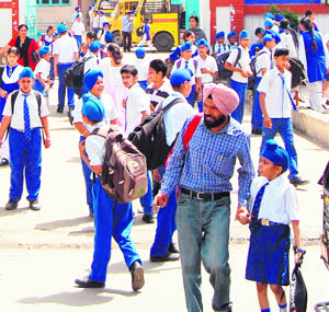 Children come out after school hours in Amritsar. 