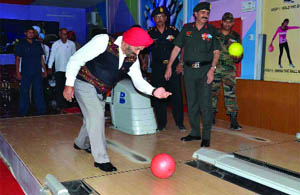 General (retd) JJ Singh tries his hand at bowling on the bowling alley complex at the Golden Arrow Colosseum in Ferozepur on Monday. 