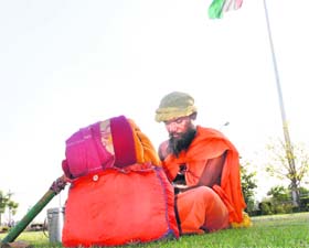 A sadhu on the banks of the Brahmsarovar in Kurukshetra