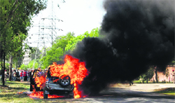 An SUV which caught fire near the Khalsa College ROB in Jalandhar