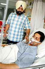  Tejkaran Singh with his father Gurmeet Singh in hospital in Amritsar on Tuesday