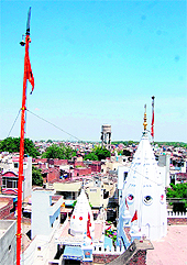 A gurdwara and a temple situated in the same complex at Pashoria Nagar in Amritsar