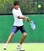 Faisal Gamar returns a shot during his match of the CLTA-AITA Super Series at the Lake Club in Chandigarh on Tuesday.