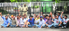 PUSU members stage a dharna in front of the Vice-Chancellors office at Panjab University in Chandigarh on Tuesday.