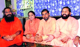 Vinod Maharaj of the Samajik Sena along with other saints in Haridwar on Tuesday