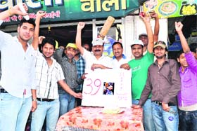 Ardent Sachin Tendulkar fans celebrate his 39th birthday at Brijwasi, Ranipur Mod, in Haridwar on Tuesday