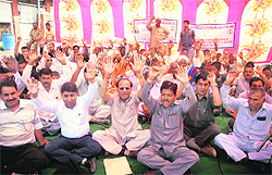 Members of the All-J&K Schedule Caste Welfare Association stage a protest in Jammu on Tuesday