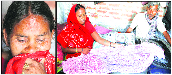 Chandravati breaks down into tears while packing the belongings of her husband in Jalandhar on Tuesday.