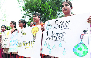 Students of St Soldier Divine Public School, Kapurthala Road, hold an awareness rally on Save water, save electricity, save earth in Jalandhar on Tuesday.