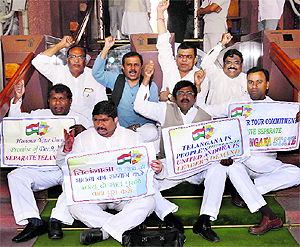Telangana MPs protest at Parliament House on Day 1 of the second phase of the Budget Session that resumed in New Delhi on Tuesday