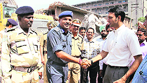 Deputy Commissioner Priyan Bharti (right) meets NDRF commandant RK Verma after the rescue work ended on Tuesday.