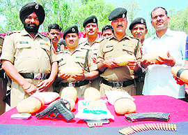 BSF personnel with the seized contraband near Amritsar