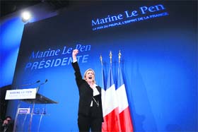 French Far Right party Front national candidate Marine Le Pen celebrates during a rally in Paris