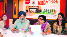Members of the Rehabilitation and Settlement Organisation announce the date of the marathon to be held in Amritsar.