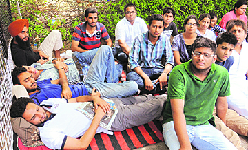 PUSU members sit on hunger strike in front of the Vice-Chancellors office in Chandigarh on Wednesday.