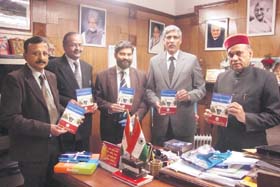 Chief Minister PK Dhumal releases a medical bulletin on Wednesday