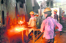 Labourers working in a hand tool factory of Jalandhar.