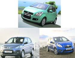 Petrol car models of different companies. A Tribune photograph