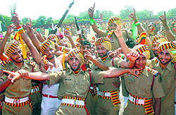Jawans of the 157th batch of the Punjab Police in a jubilant mood after their passing out parade at the PAP ground in Jalandhar on Wednesday