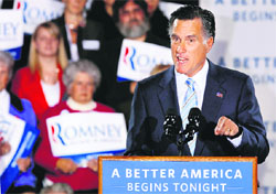 Republican presidential candidate Mitt Romney addresses supporters in Manchester, New Hampshire.