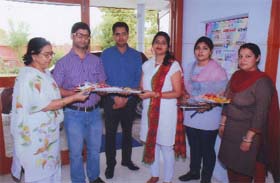 Centre head Raj Gupta (extreme left) along with other staff members welcoming the members of the PTU inspection team in Bathinda on Thursday