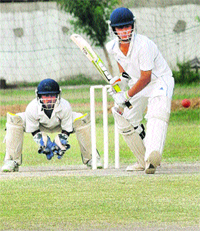 A Patiala batsman plays a shot against Chandigarh during an inter-state cricket tournament at DAV School, Sector 8, Chandigarh, on Thursday