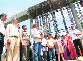 Irrigation and Public Health Minister Ravinder Ravi inspects work on the Shah canal project at Sunjwa Indora tehsil, about 130 km from Dharmasala, on Thursday.