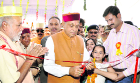 Chief Minister PK Dhumal inaugurates the Triloki Nath temple at Gubbar in Hamirpur on Thursday.