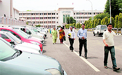 People coming out of the civil secretariat on the eve of the annual darbar move (shifting of capital to Srinagar) in Jammu on Thursday