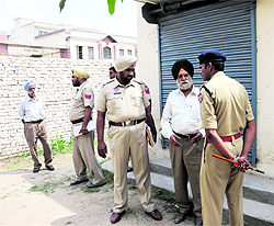 Police officials enquire about the incident of illegal possession